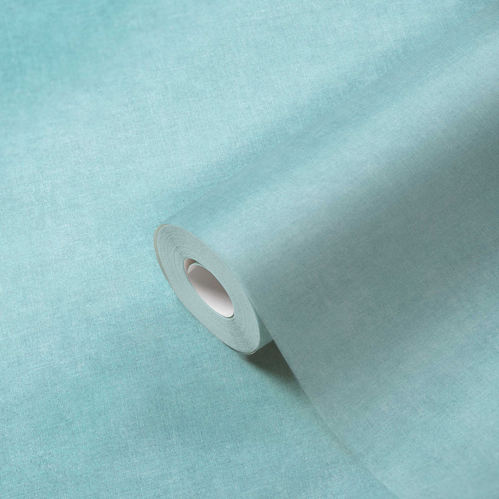             Papier peint bleu uni & mat avec motifs structurés
        