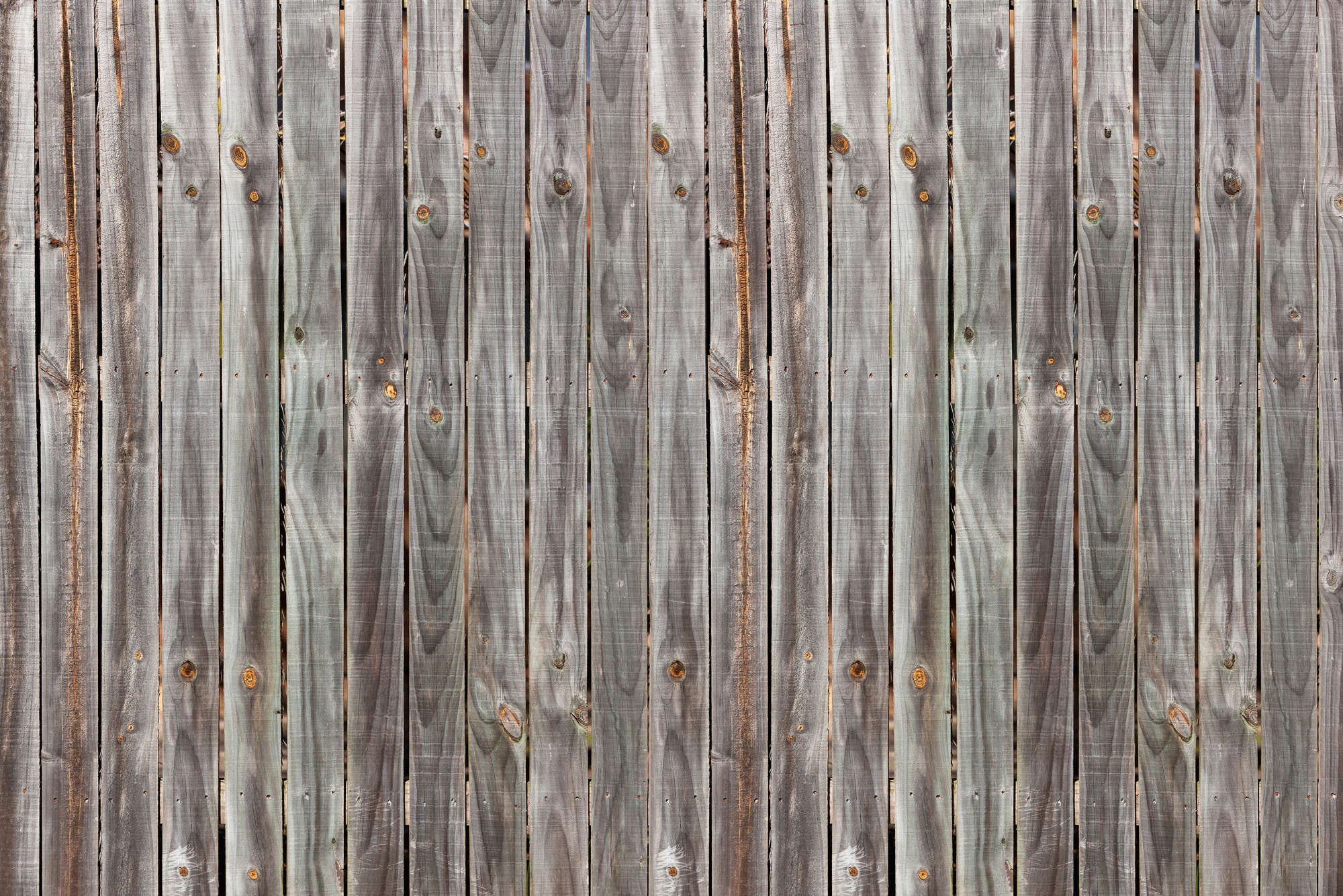             Bois foncé - Mur de planches rustique, clôture de planches usées par le temps
        