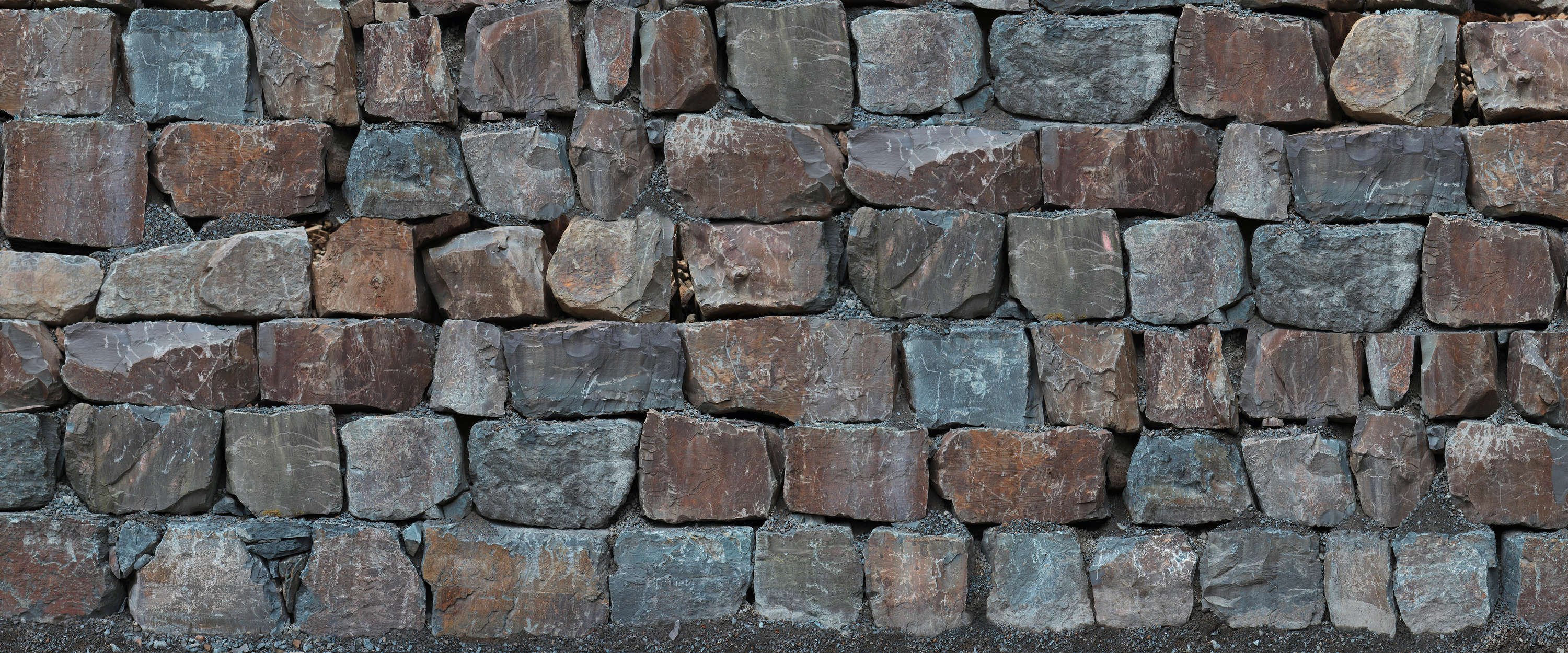             Mur de pierres Papier peint panoramique avec de gros blocs de roche
        