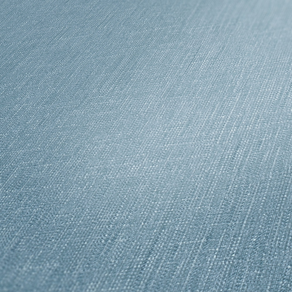             Carta da parati in tessuto non tessuto blu screziato con struttura tessile in stile bouclé
        