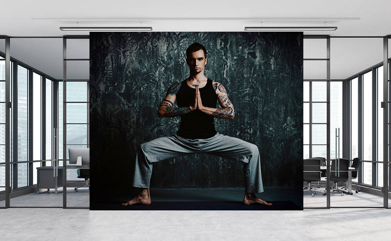             Chandra 1 - Man doing yoga pose as a photo wallpaper in natural linen structure - Blue, Black | Matt smooth fleece
        