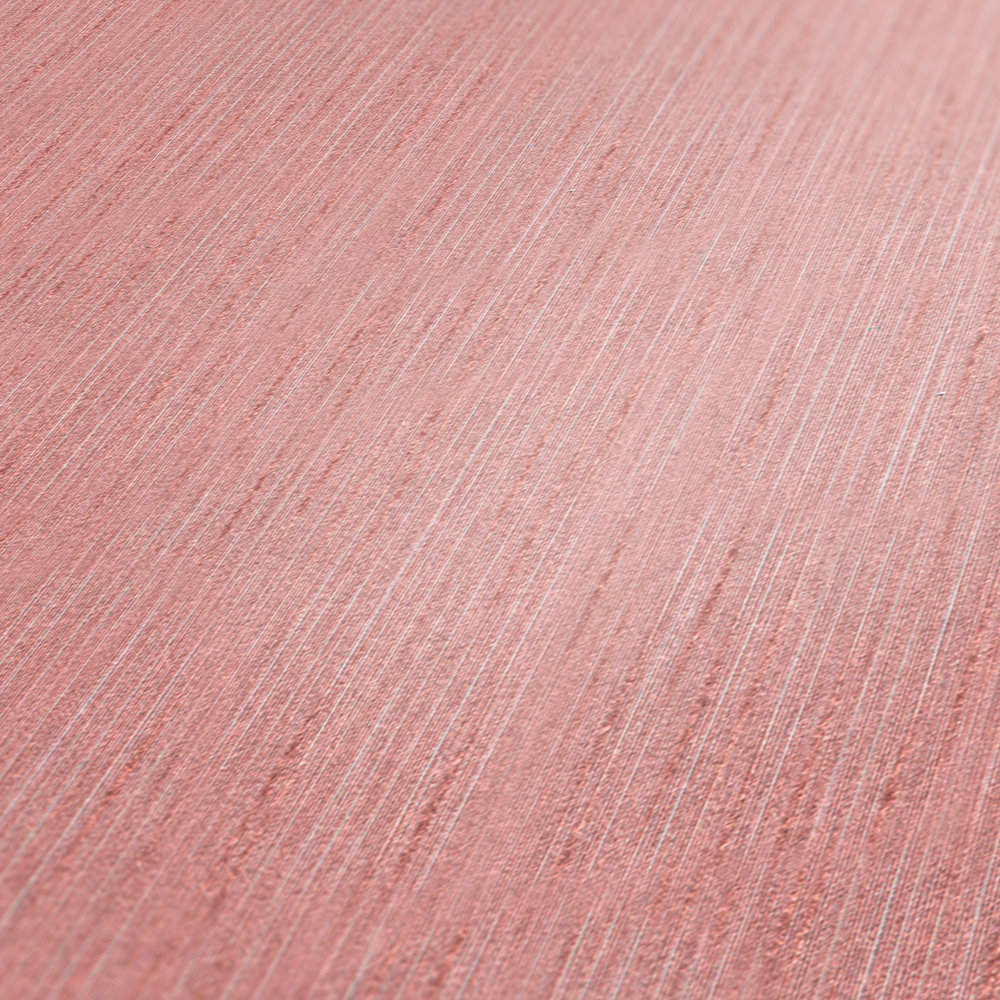             Carta da parati rosa antico tinta unita con effetto texture
        