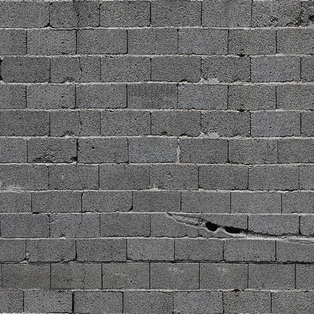 Papier peint panoramique mur de pierre gris avec des blocs de béton

