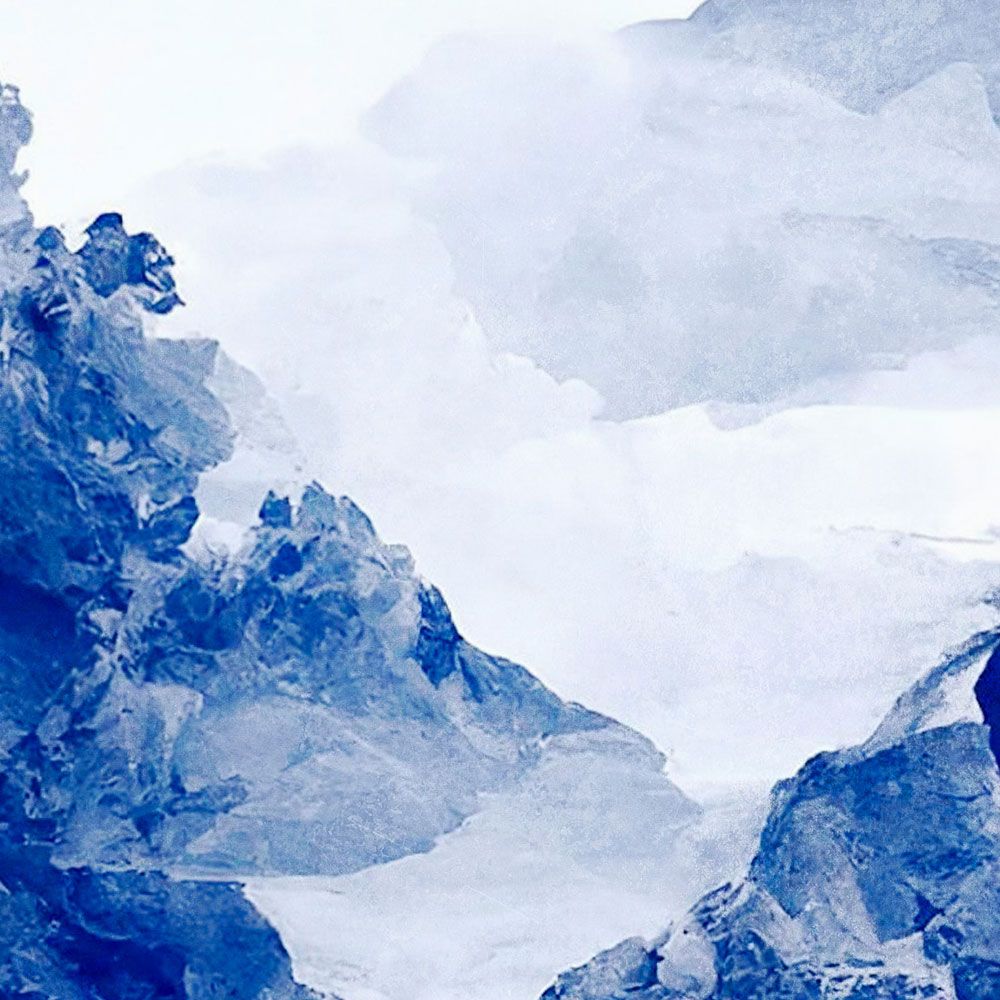             Photo wallpaper »tinterra 3« - Landscape with mountains & fog - Blue | Light textured non-woven
        