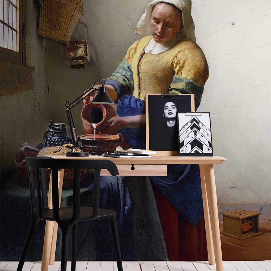         Maid with milk jug mural by Jan Vermeer
    