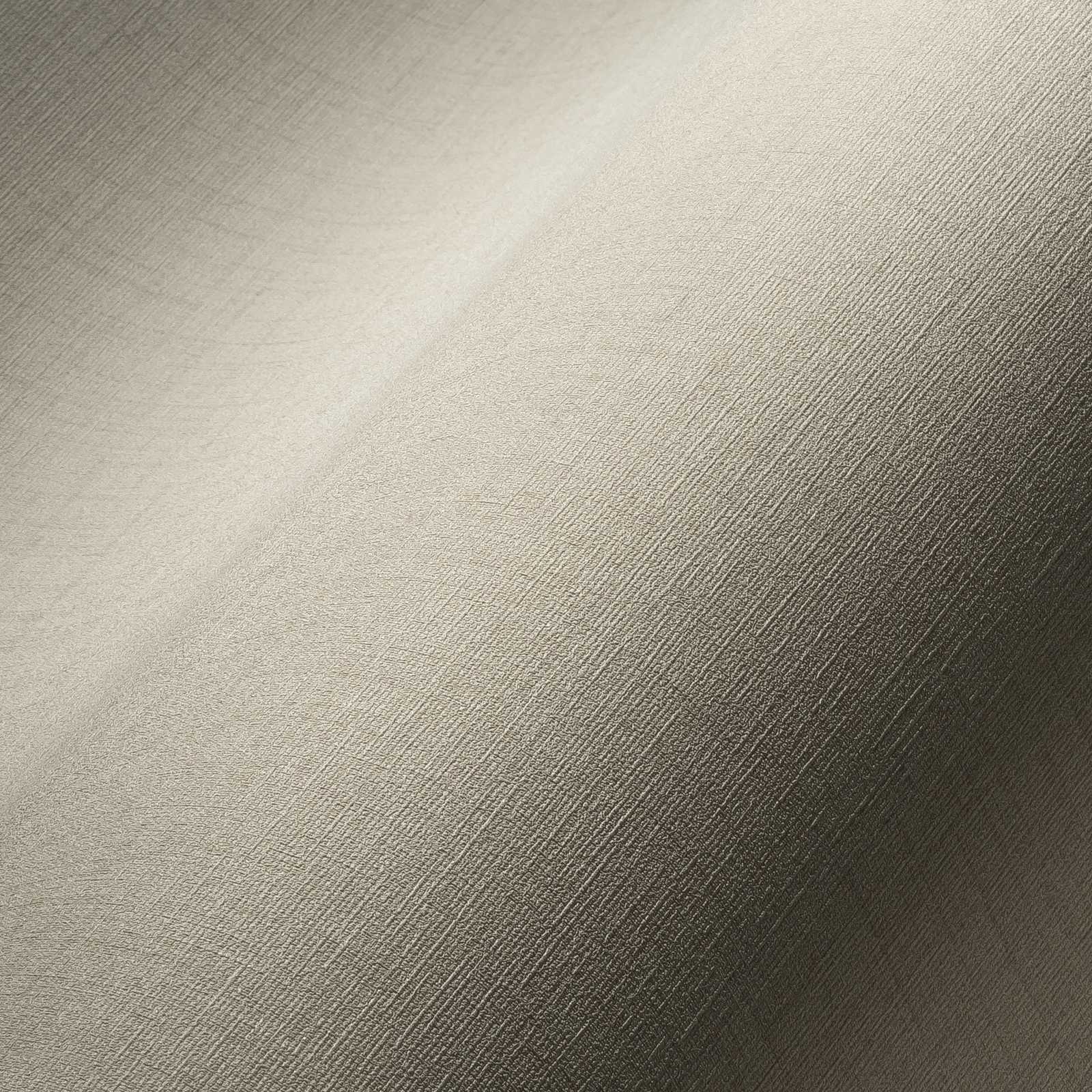             behang effen beige met textielstructuur - grijs
        
