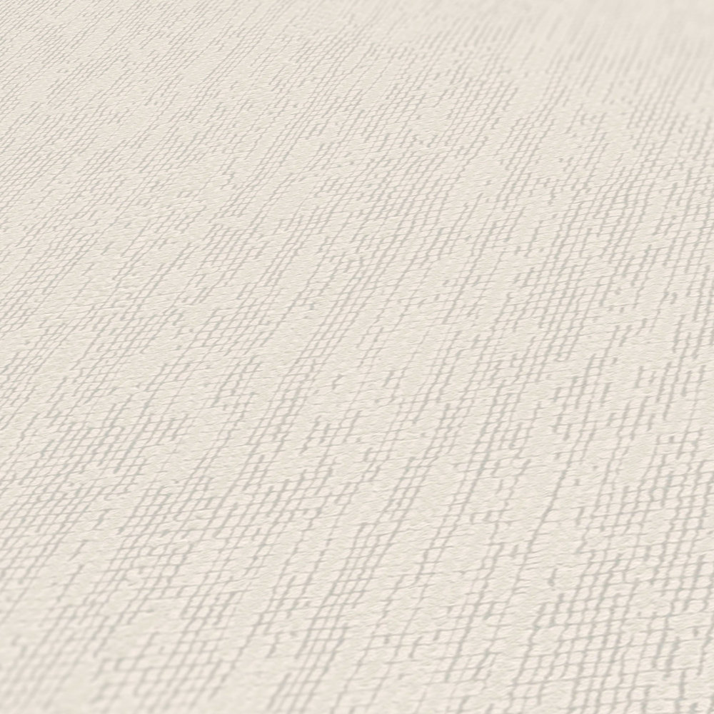             Papier peint uni avec détails structurés style scandi - crème
        