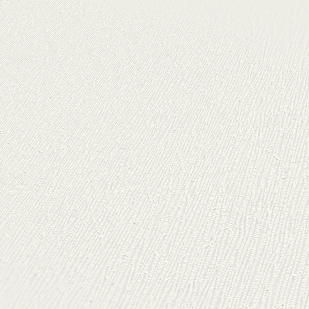             Vliesbehang wit met natuurlijk ton sur ton structuurpatroon
        