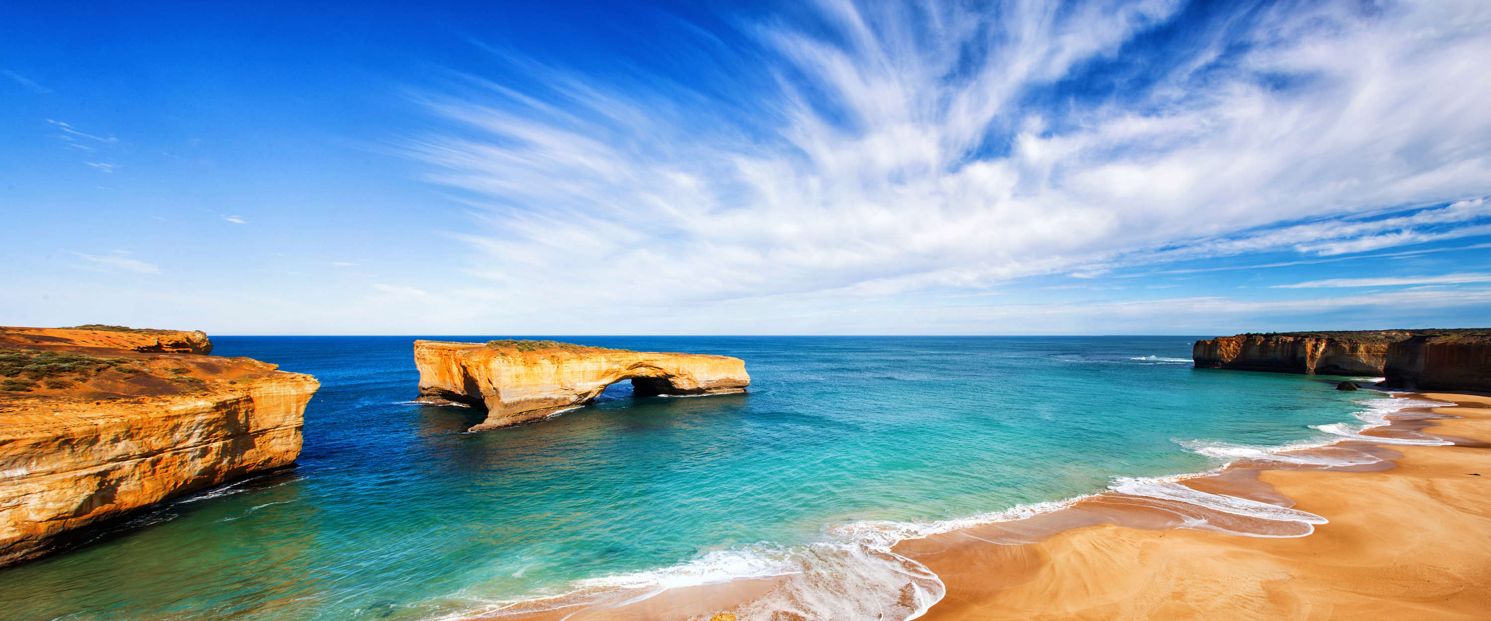             Sea coast rock cliffs, beach & blue sea mural
        