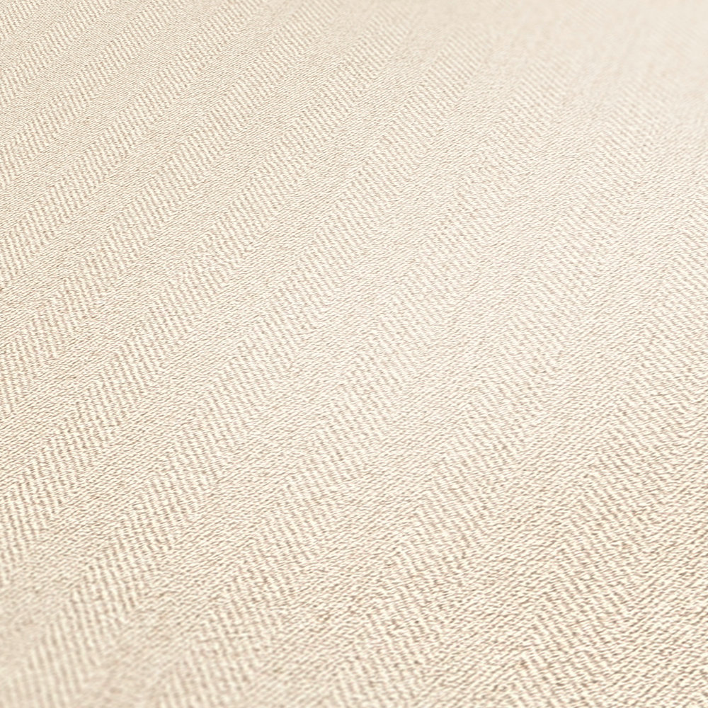             Beige non-woven wallpaper with herringbone structure
        