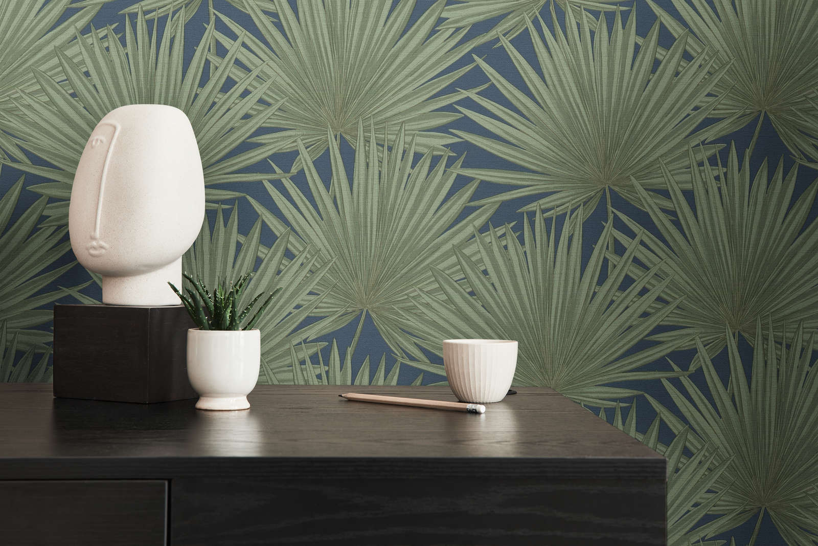             Non-woven wallpaper with palm leaves on a subtle background - green, blue
        