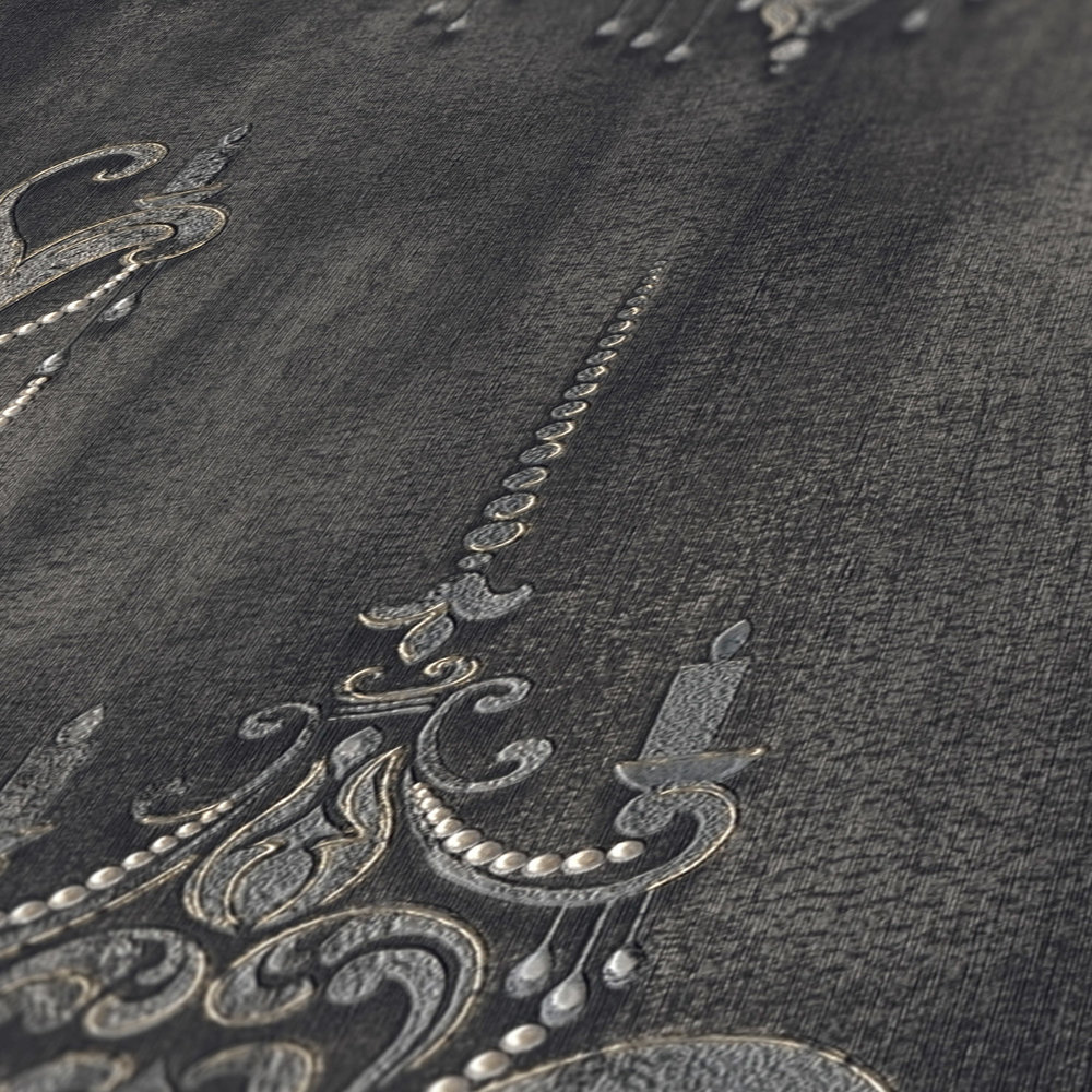             Papier peint noir motif perles, ornements & effet métallique
        
