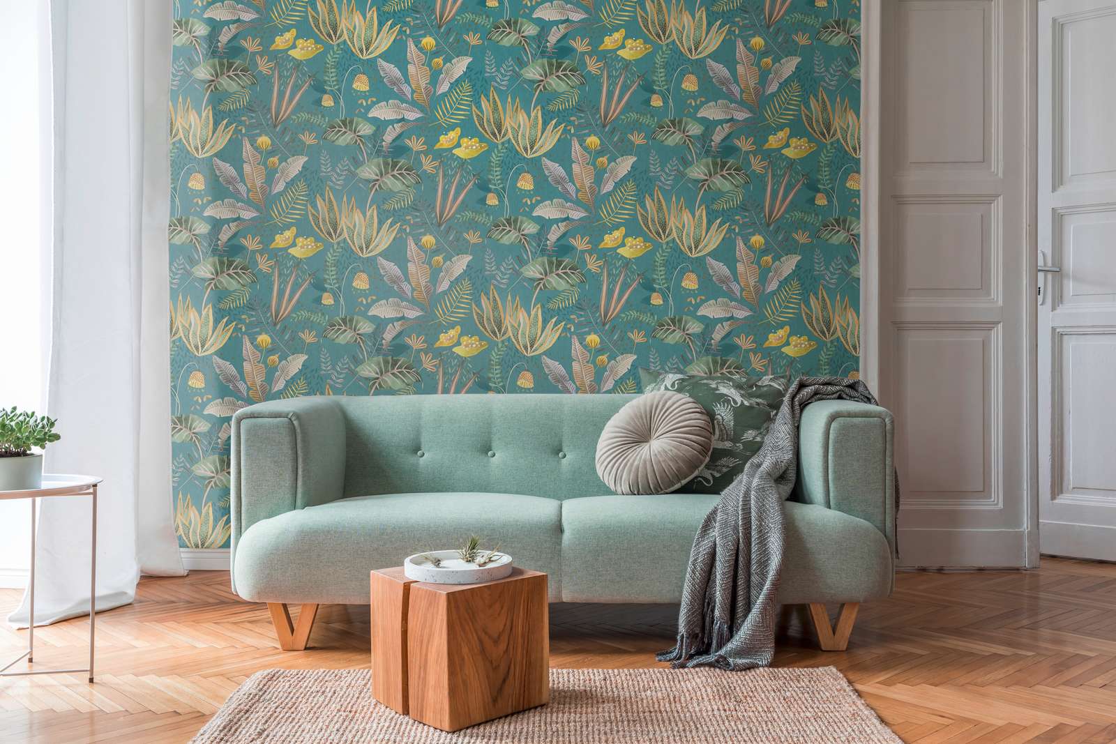             Non-woven wallpaper floral with mixed leaves light textured, matt - petrol, green, yellow
        