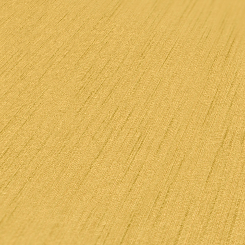             Mosterdgeel vliesbehang met gevlekt patroon - geel
        