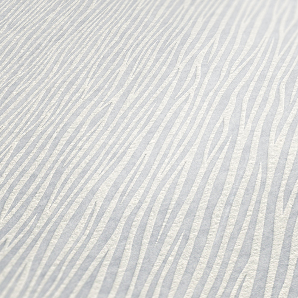             Papel pintado no tejido con diseño de líneas naturales
        