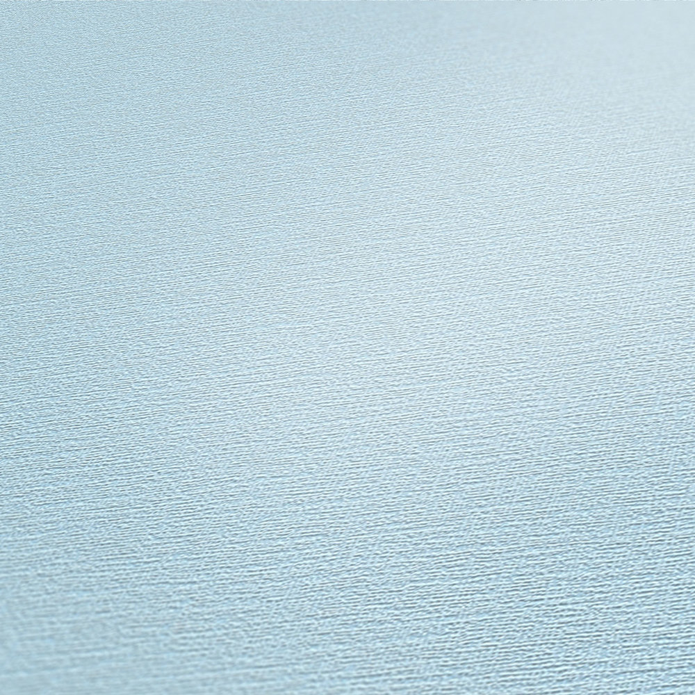             Papel pintado no tejido azul claro liso mate con diseño texturizado
        