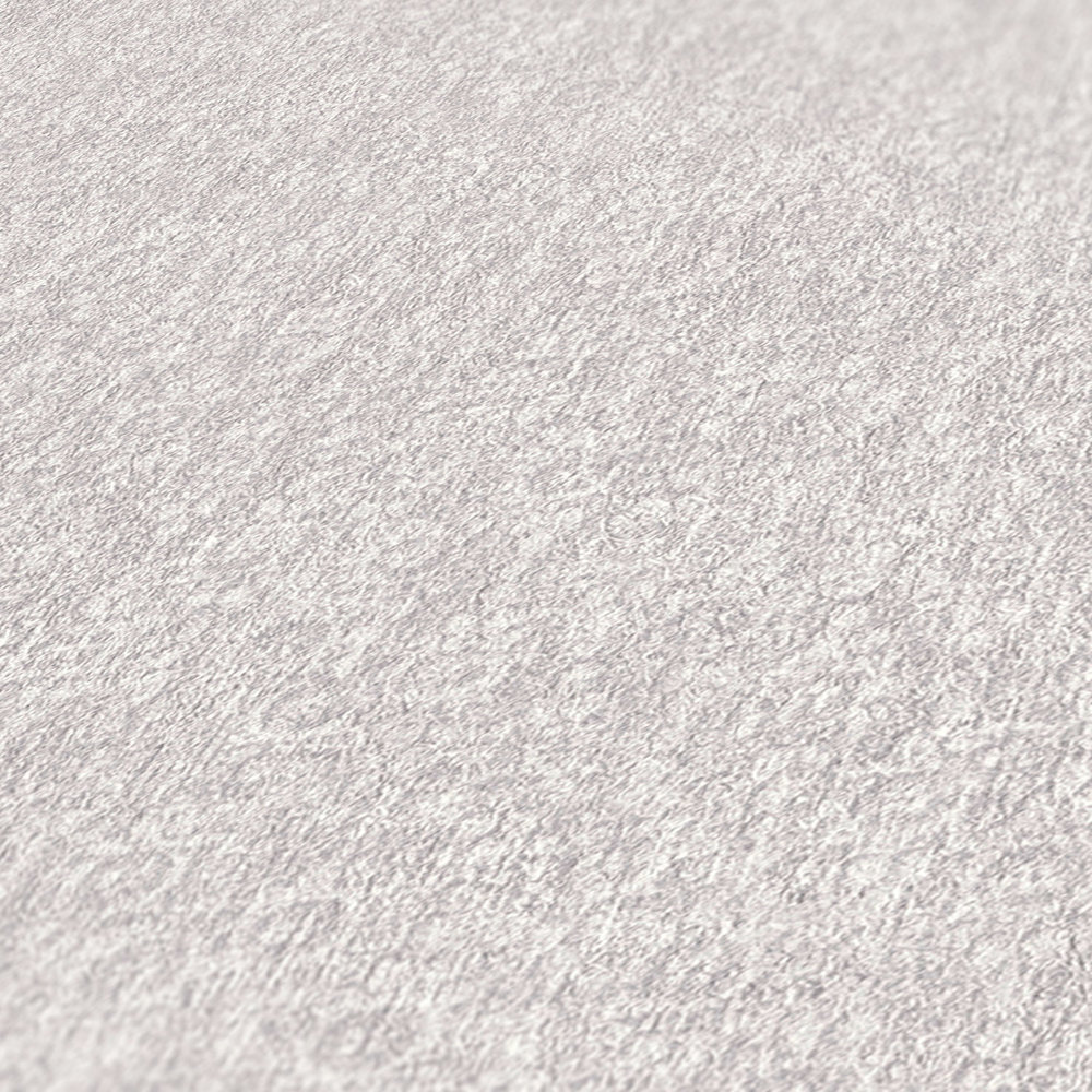             Papel pintado liso no tejido crema con efecto de textura textil
        
