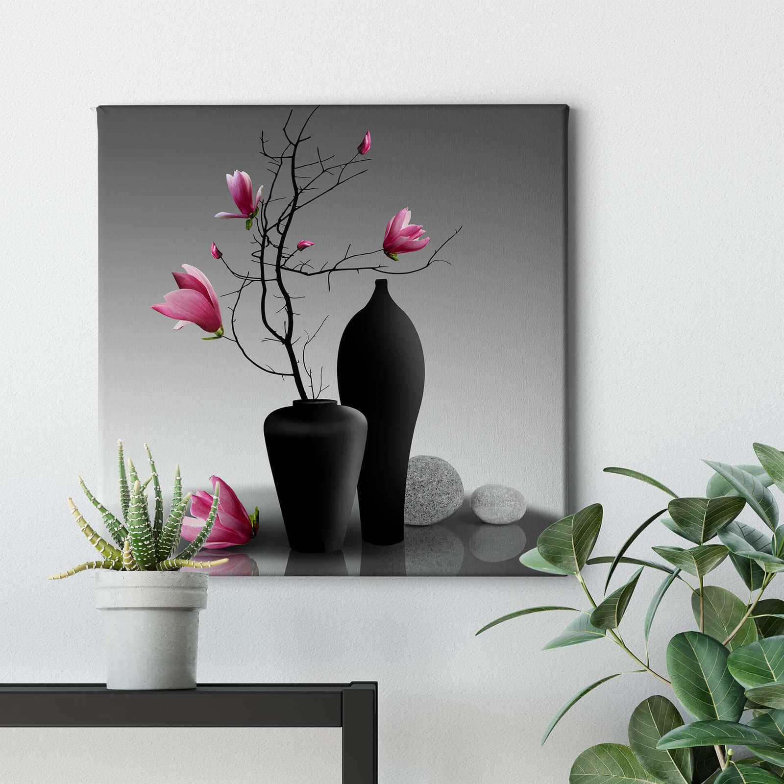             Canvas print square magnolia branch in a black vase
        