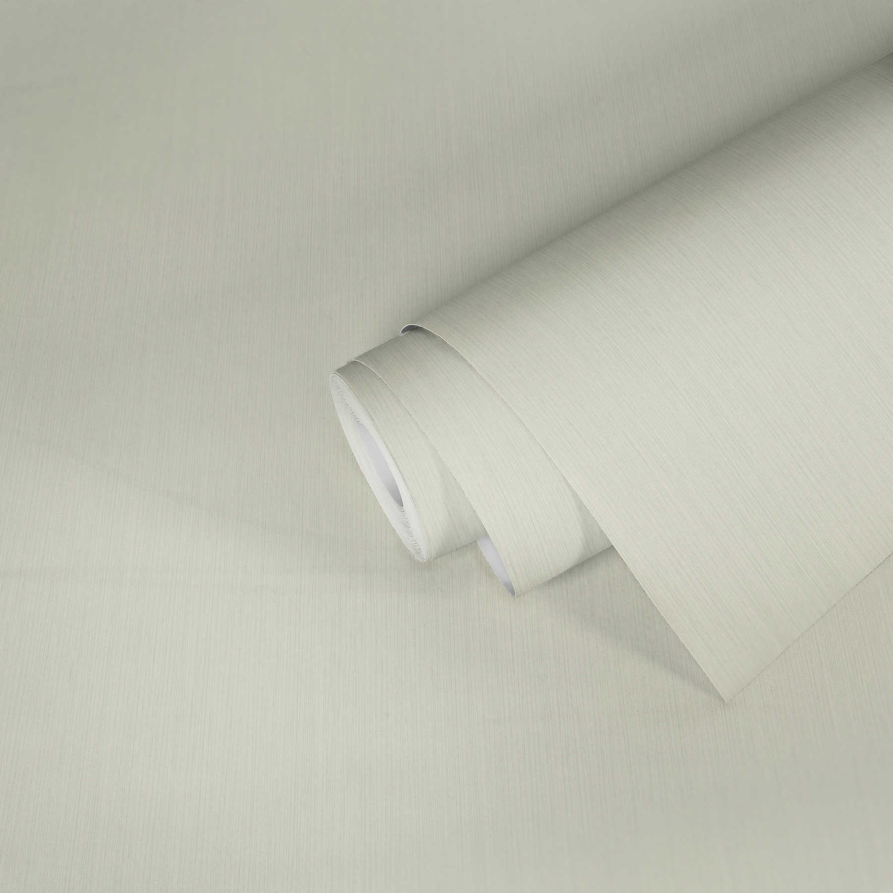             Papier peint intissé blanc uni avec effet scintillant & structure gaufrée
        
