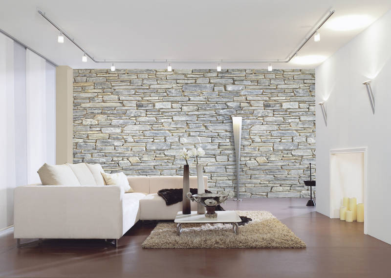             Mur de pierres Papier peint panoramique gris clair aspect pierre naturelle
        