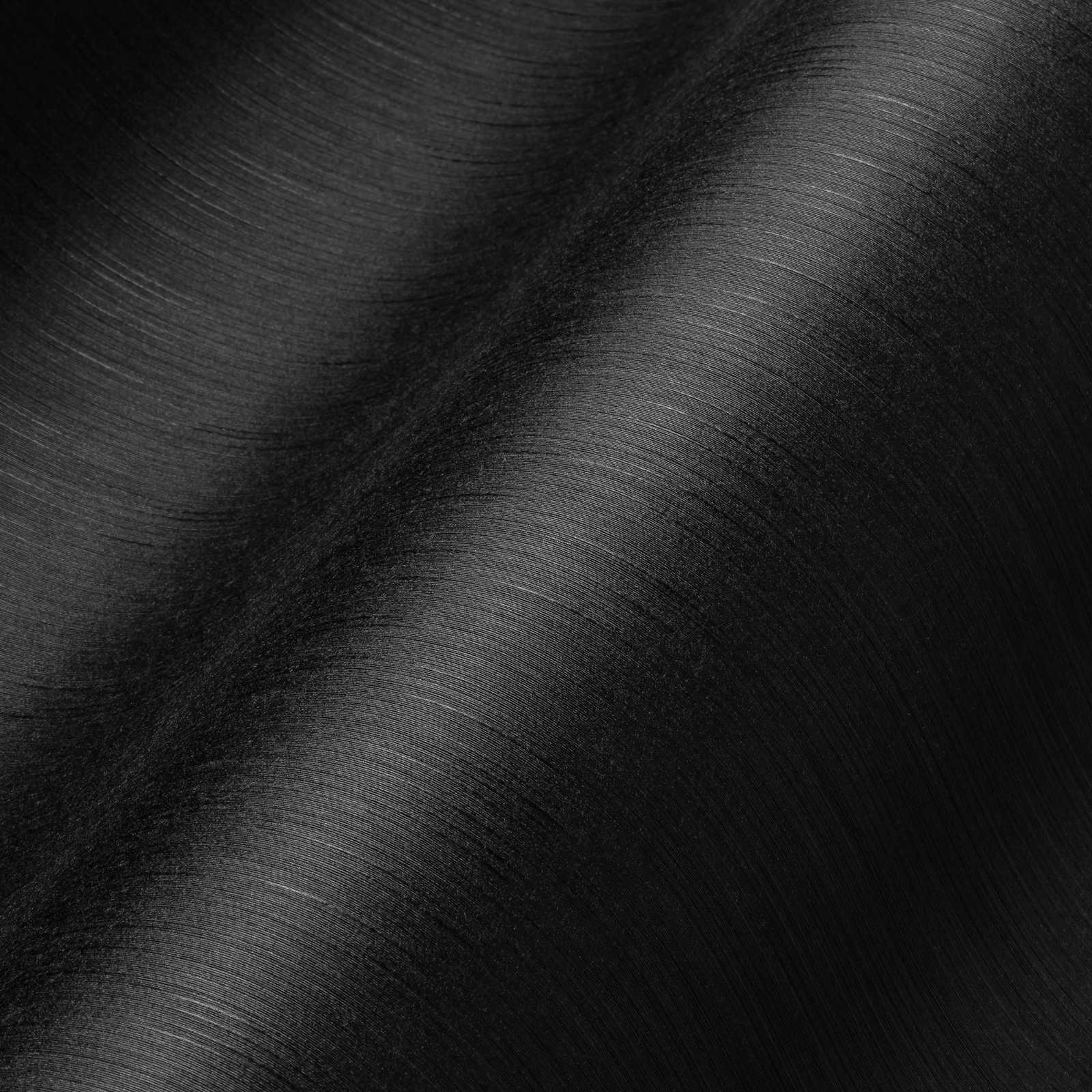             Papier peint intissé noir avec effet texturé chiné
        