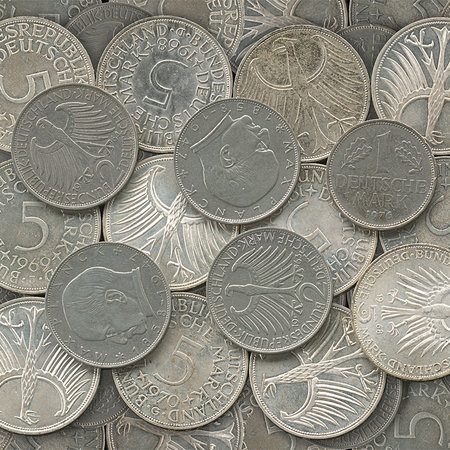         Silver coins mural in detail with 3D effect
    