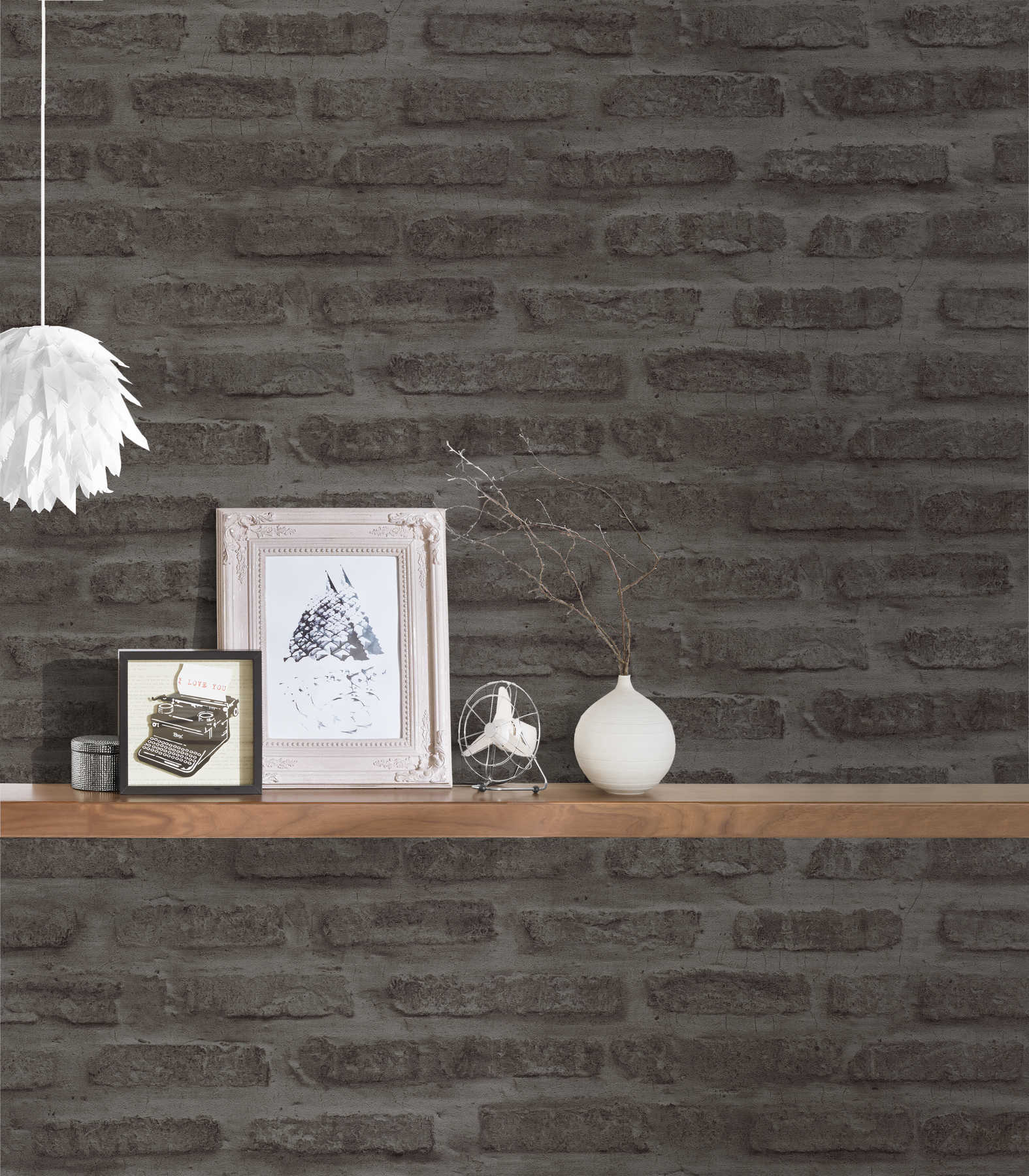             Antraciet vliesbehang met steenlook & bakstenen muur - grijs, zwart
        
