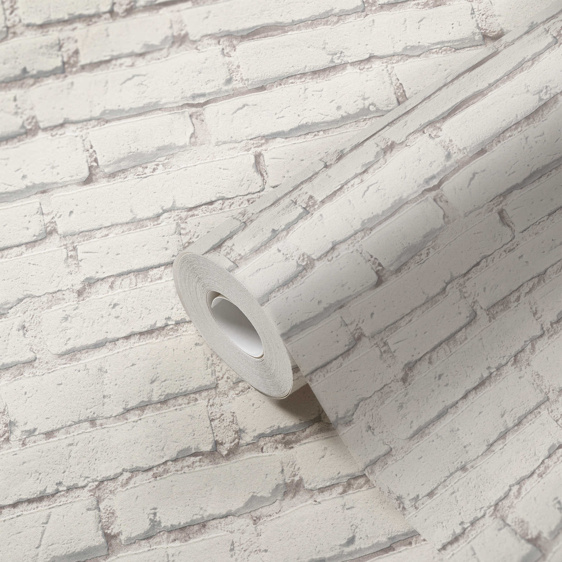             Wallpaper with brick wall with white stones and joints - white, grey
        