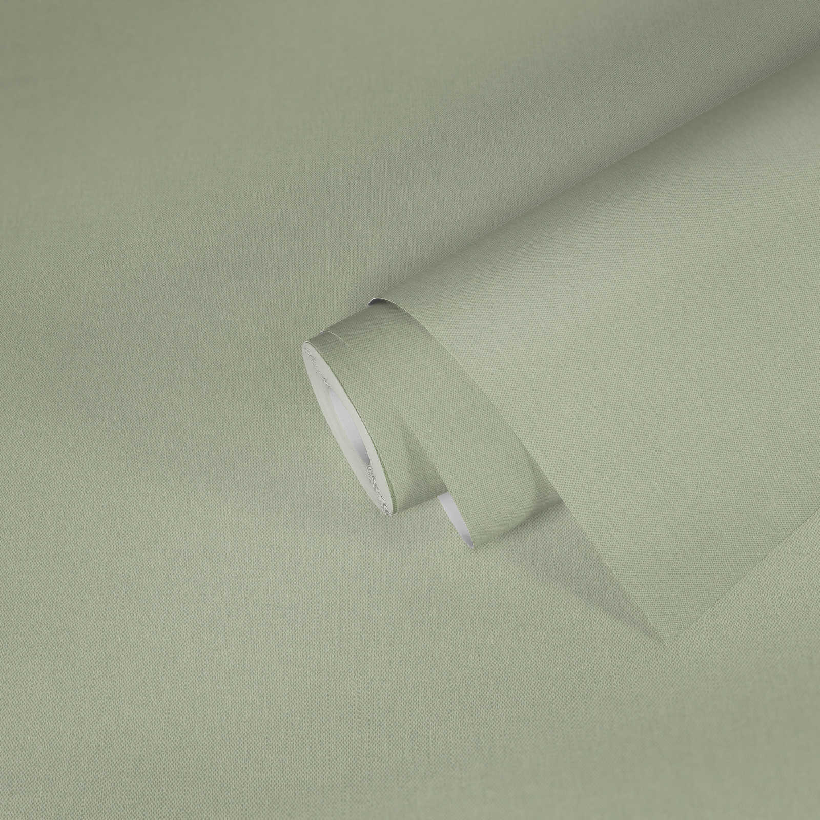             Papel pintado liso verde claro pastel con estructura textil - verde
        