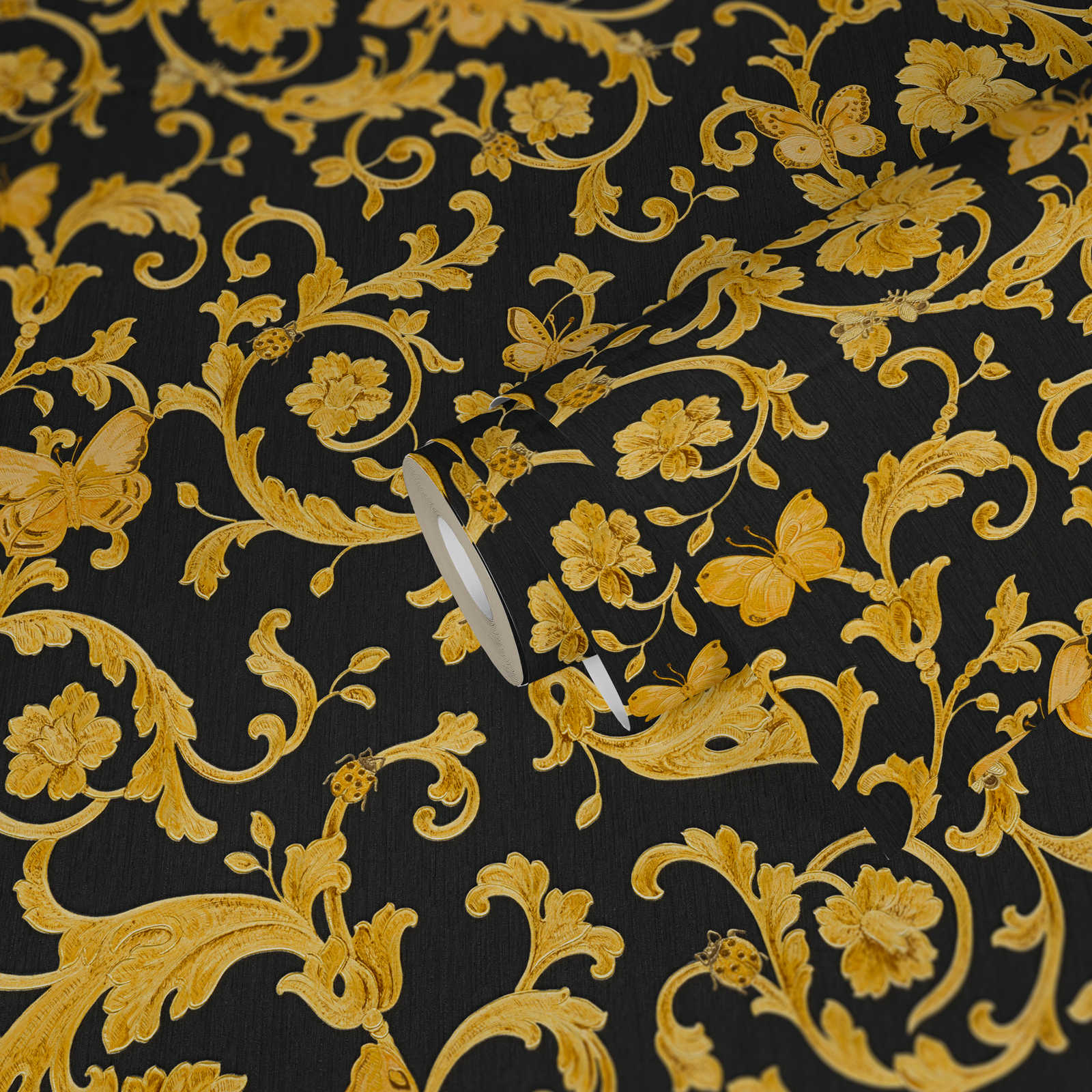            Black VERSACE wallpaper with gold ornaments & butterfly
        