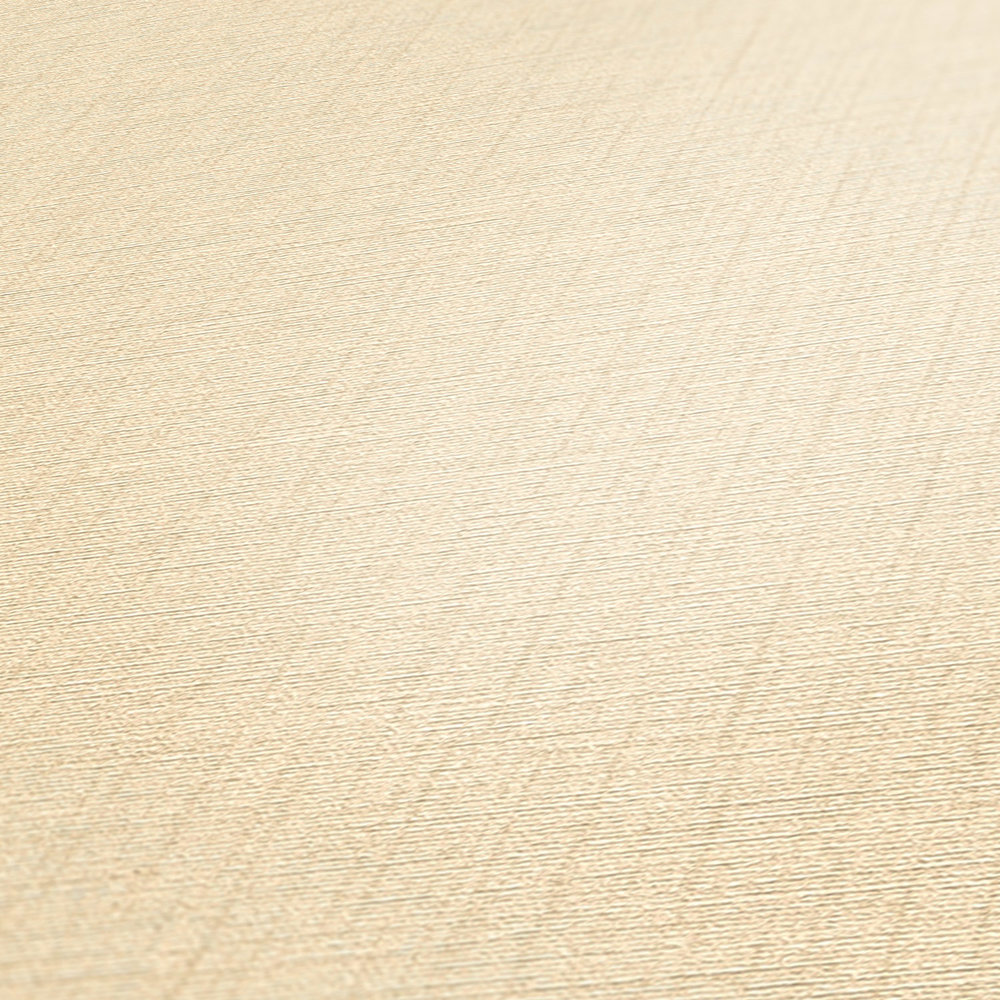             Papel pintado no tejido beige con estructura de lino, liso y moteado
        
