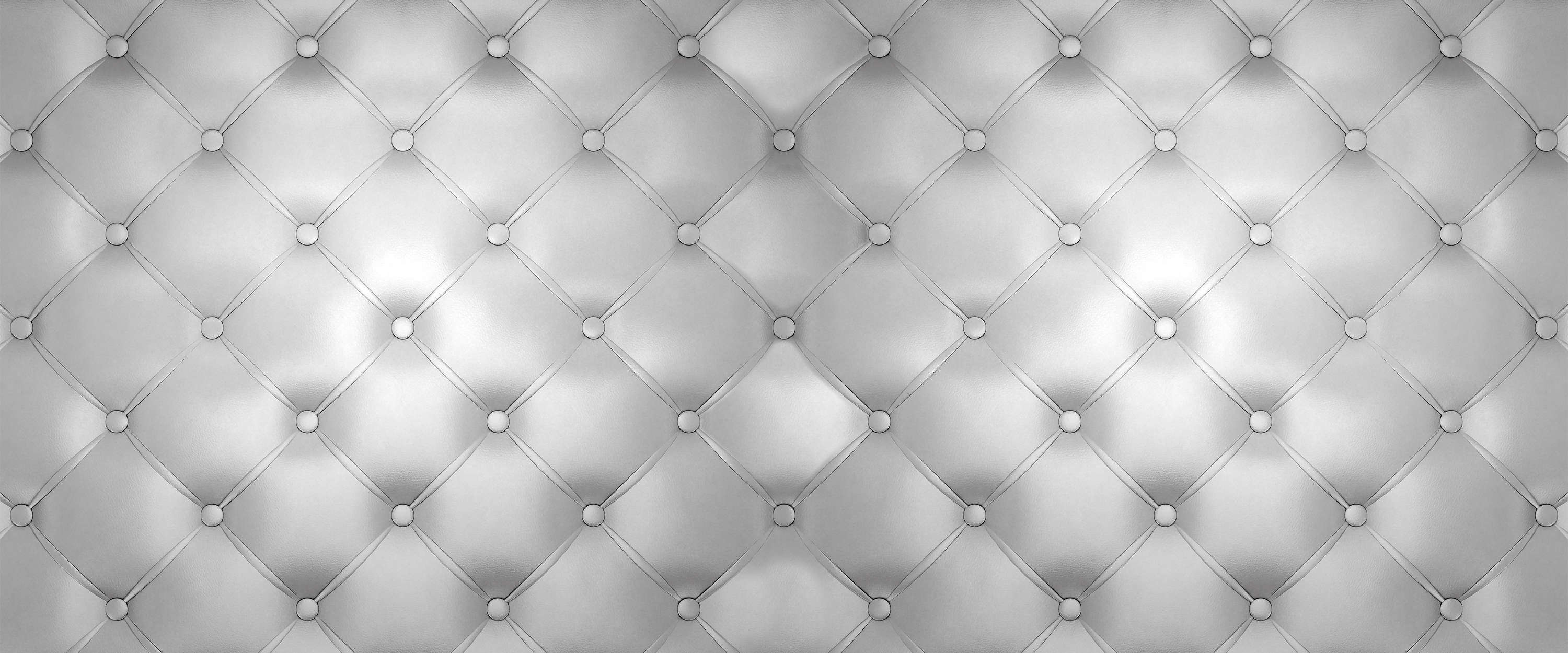             Papier peint panoramique 3D aspect capitonné gris argenté avec motif en losange
        