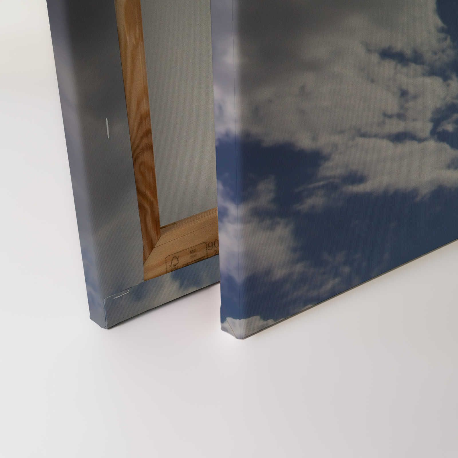             Hemelsblauw - Canvas schilderij Zonneschijn & blauwe wolkenlucht - 1,20 m x 0,80 m
        